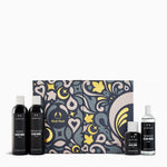 Collection of 'Black Musk' products including bottles and a decorative box on a white background